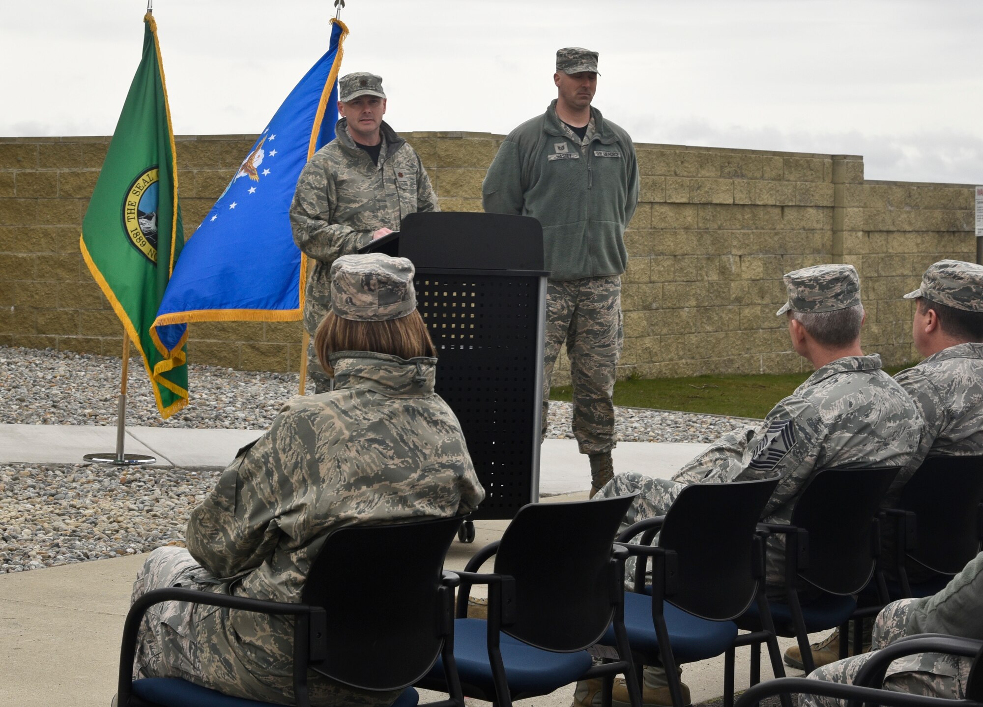 Maj. Lance Vann, 92nd Logistics Readiness Squadron commander, speaks during the Ribbon Cutting Ceremony for the new Passenger Terminal March 25, 2016, at Fairchild Air Force Base, Wash. The PAX Terminal, which was previously located in the Base Operations building, is now located in building 2090 at the end of Hansell Ave. The new location is not only more convenient for the Airmen who work there, but also is a single location for all outgoing passengers. (U.S. Air Forcephoto/Airman 1st Class Taylor Bourgeous)