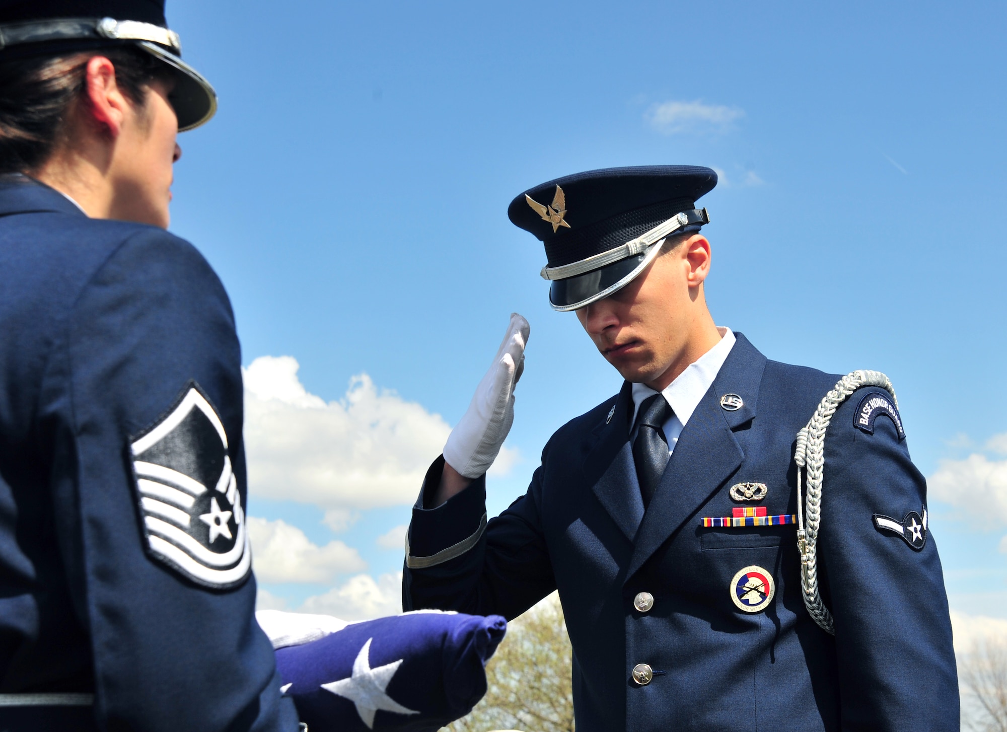 Members of Whiteman Honor Guard practice the procedures of a military funeral at Knob Noster cemetery in Knob Noster, Mo., March 15, 2016. Whiteman Honor Guard serves more than 100 counties spanning Missouri to Kansas covering more than 70,000 square miles across both states. Whiteman Honor Guard represents the respect each fallen service member deserves, and upholds traditions held dear to the armed forces. (U.S. Air Force photo by Airman 1st Class Jovan Banks)