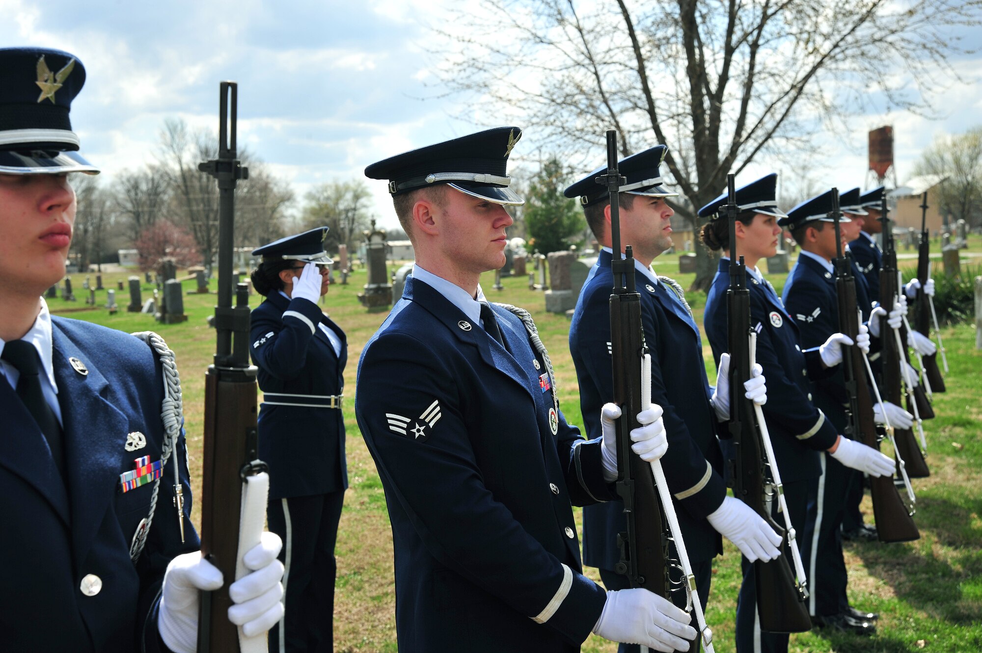 Members of Whiteman Honor Guard practice the procedures of a military funeral at Knob Noster cemetery in Knob Noster, Mo., March 15, 2016. Whiteman Honor Guard serves more than 100 counties spanning Missouri to Kansas covering more than 70,000 square miles across both states. Whiteman Honor Guard represents the respect each fallen service member deserves, and upholds traditions held dear to the armed forces. (U.S. Air Force photo by Airman 1st Class Jovan Banks)