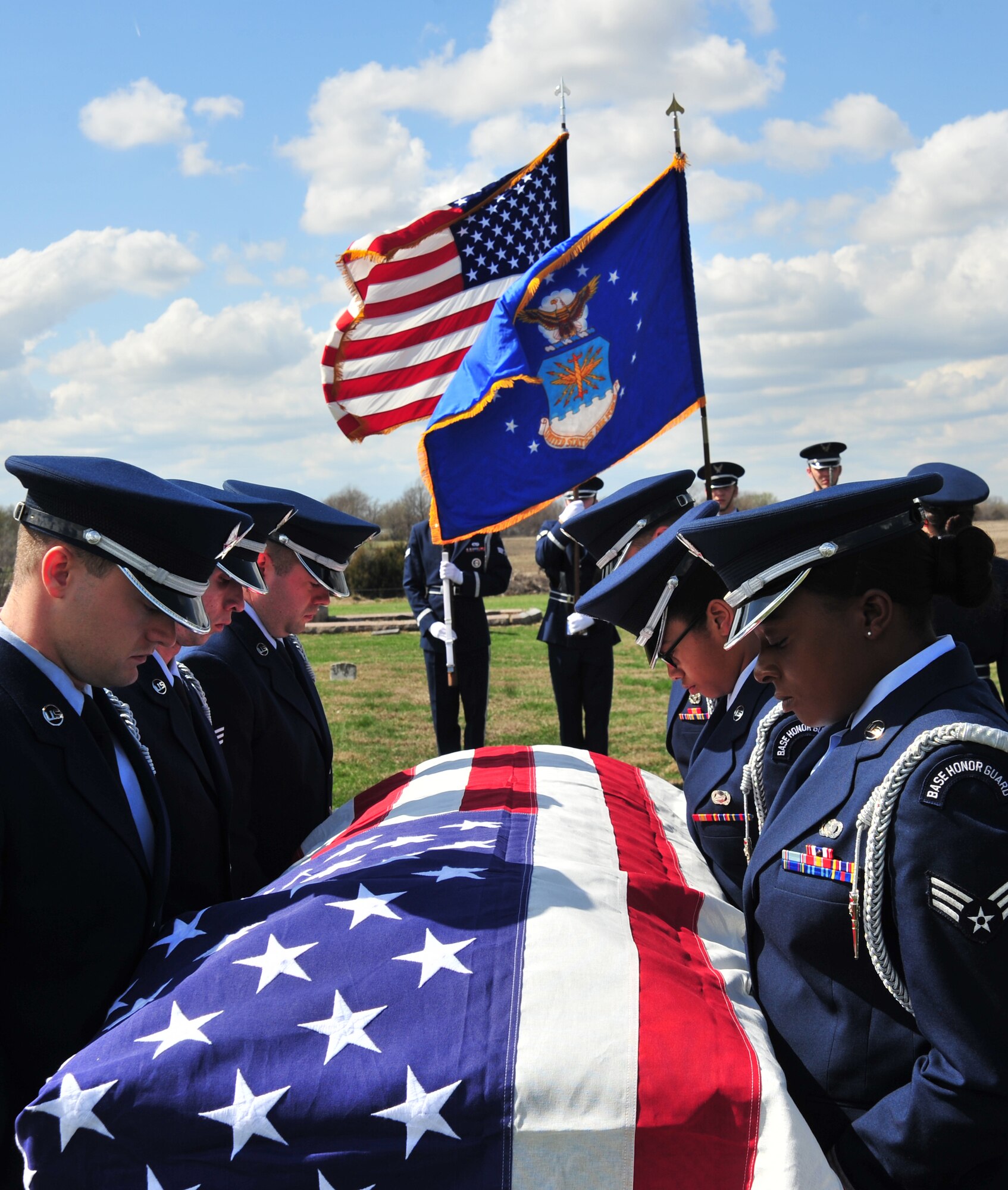 Members of Whiteman Honor Guard practice the procedures of a military funeral at Knob Noster cemetery in Knob Noster, Mo., March 15, 2016. Whiteman Honor Guard serves more than 100 counties spanning Missouri to Kansas covering more than 70,000 square miles across both states. Whiteman Honor Guard represents the respect each fallen service member deserves, and upholds traditions held dear to the armed forces. (U.S. Air Force photo by Airman 1st Class Jovan Banks)