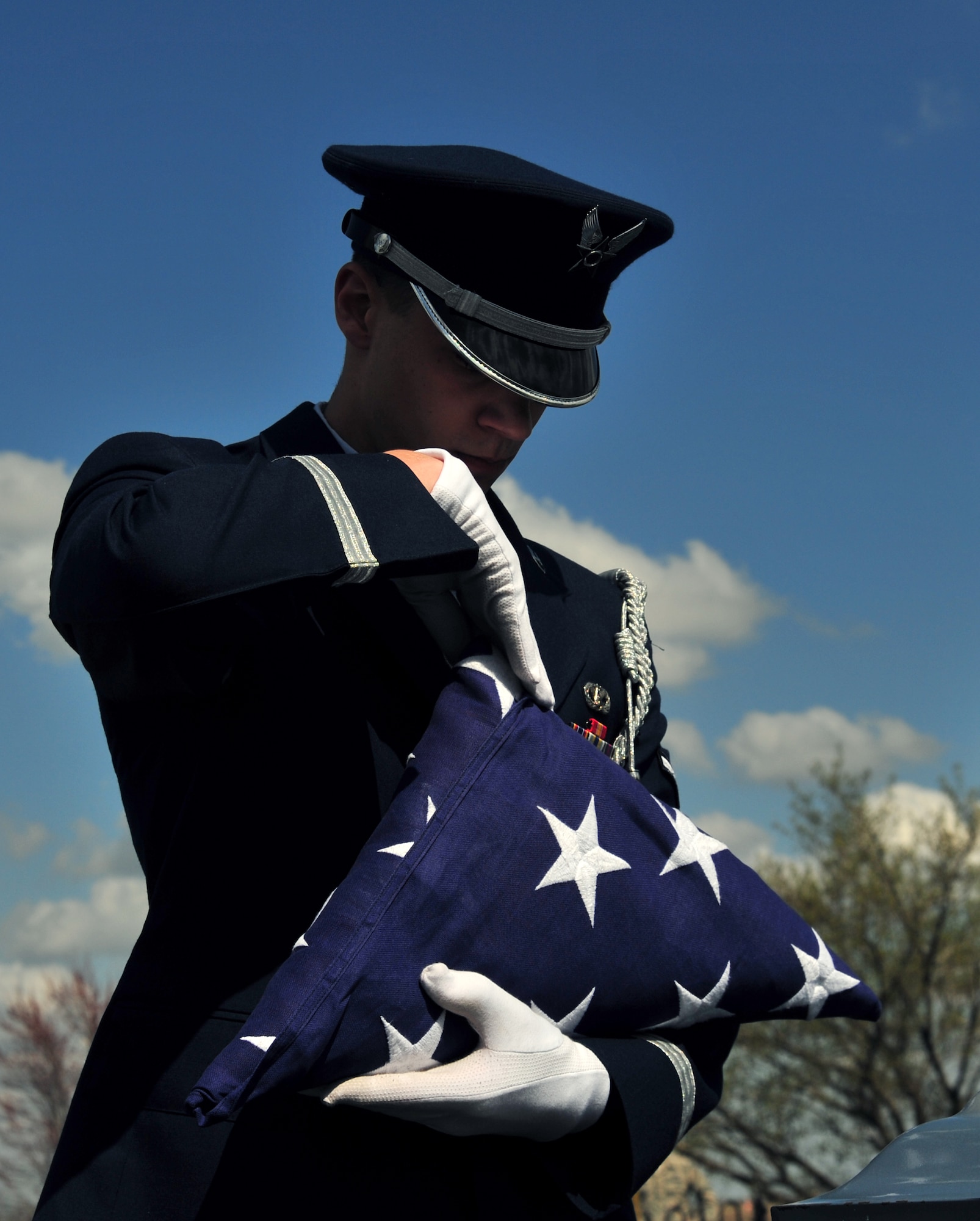 Members of Whiteman Honor Guard practice the procedures of a military funeral at Knob Noster cemetery in Knob Noster, Mo., March 15, 2016. Whiteman Honor Guard serves more than 100 counties spanning Missouri to Kansas covering more than 70,000 square miles across both states. Whiteman Honor Guard represents the respect each fallen service member deserves, and upholds traditions held dear to the armed forces. (U.S. Air Force photos by Airman 1st Class Jovan Banks)