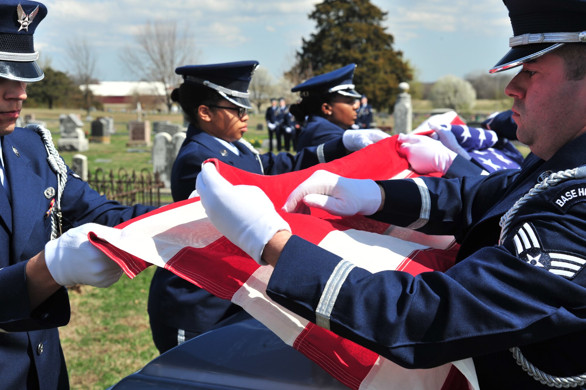 Members of Whiteman Honor Guard practice the procedures of a military funeral at Knob Noster cemetery in Knob Noster, Mo., March 15, 2016. Whiteman Honor Guard serves more than 100 counties spanning Missouri to Kansas covering more than 70,000 square miles across both states. Whiteman Honor Guard represents the respect each fallen service member deserves, and upholds traditions held dear to the armed forces. (U.S. Air Force photos by Airman 1st Class Jovan Banks)