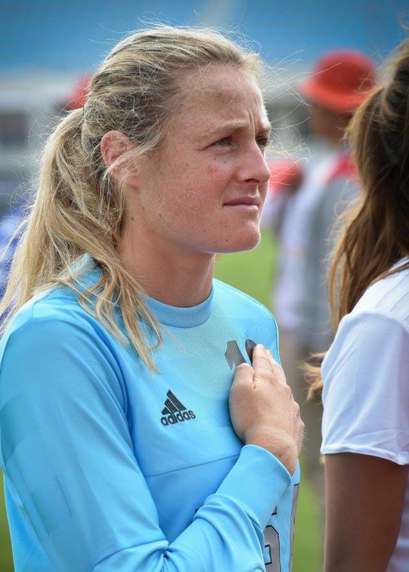 1st Lt. Alyson Gleason, 2nd Range Operations Squadron range control officer, stands for the National Anthem before a soccer game. Gleason was nominated as the female athlete of the year by the 30th Force Support Squadron sports and fitness center. (courtesy photo)