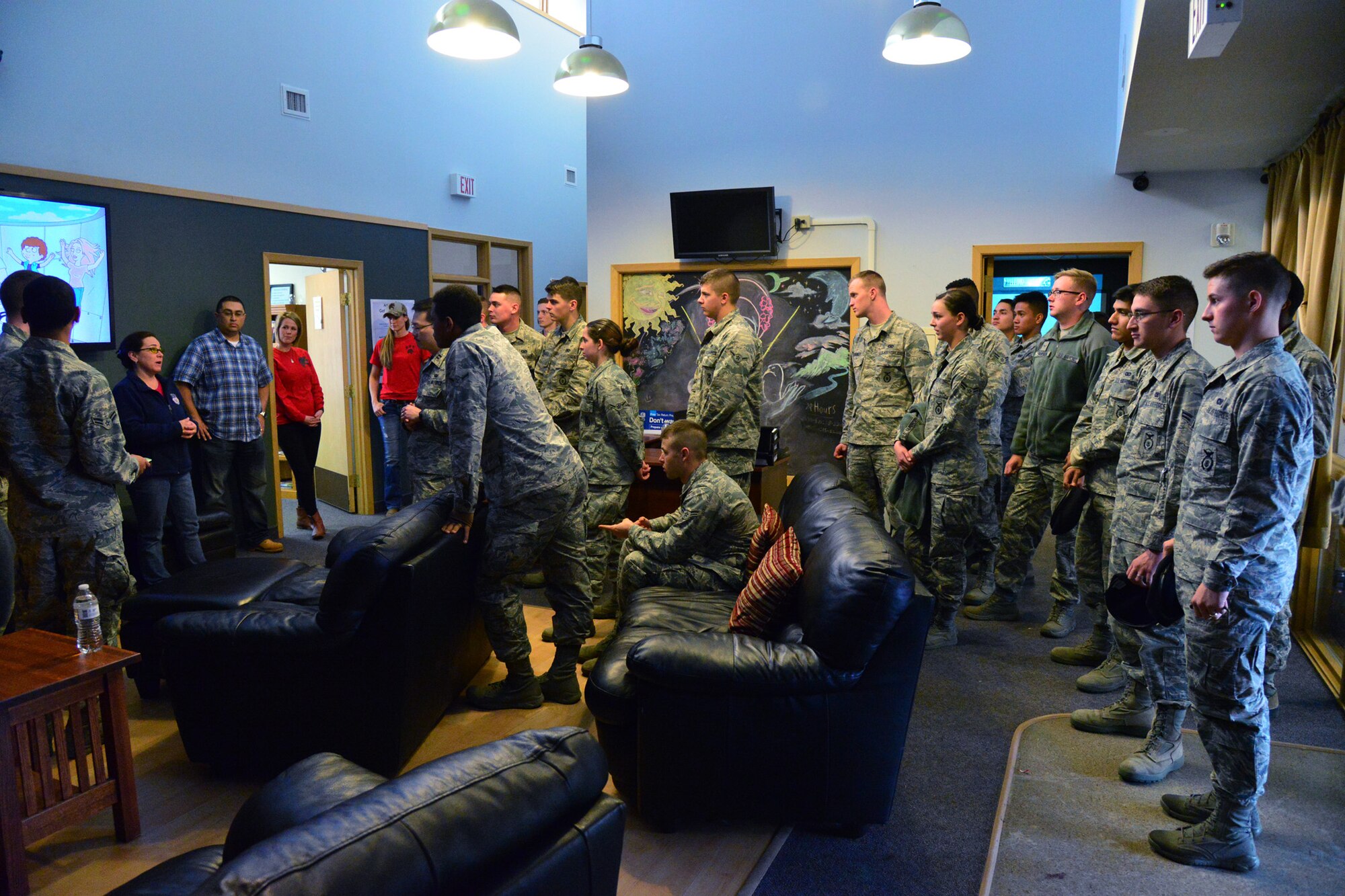 Airmen from the First Term Airmen Center attend a luncheon at the First Four Airmen’s Center March 25, 2016, at Malmstrom Air Force Base, Mont.  Airmen new to both the Air Force and the base attend a week-long series of meetings at the FTAC to learn about the mission and services available to them. (U.S. Air Force photo/Airman Daniel Brosam)