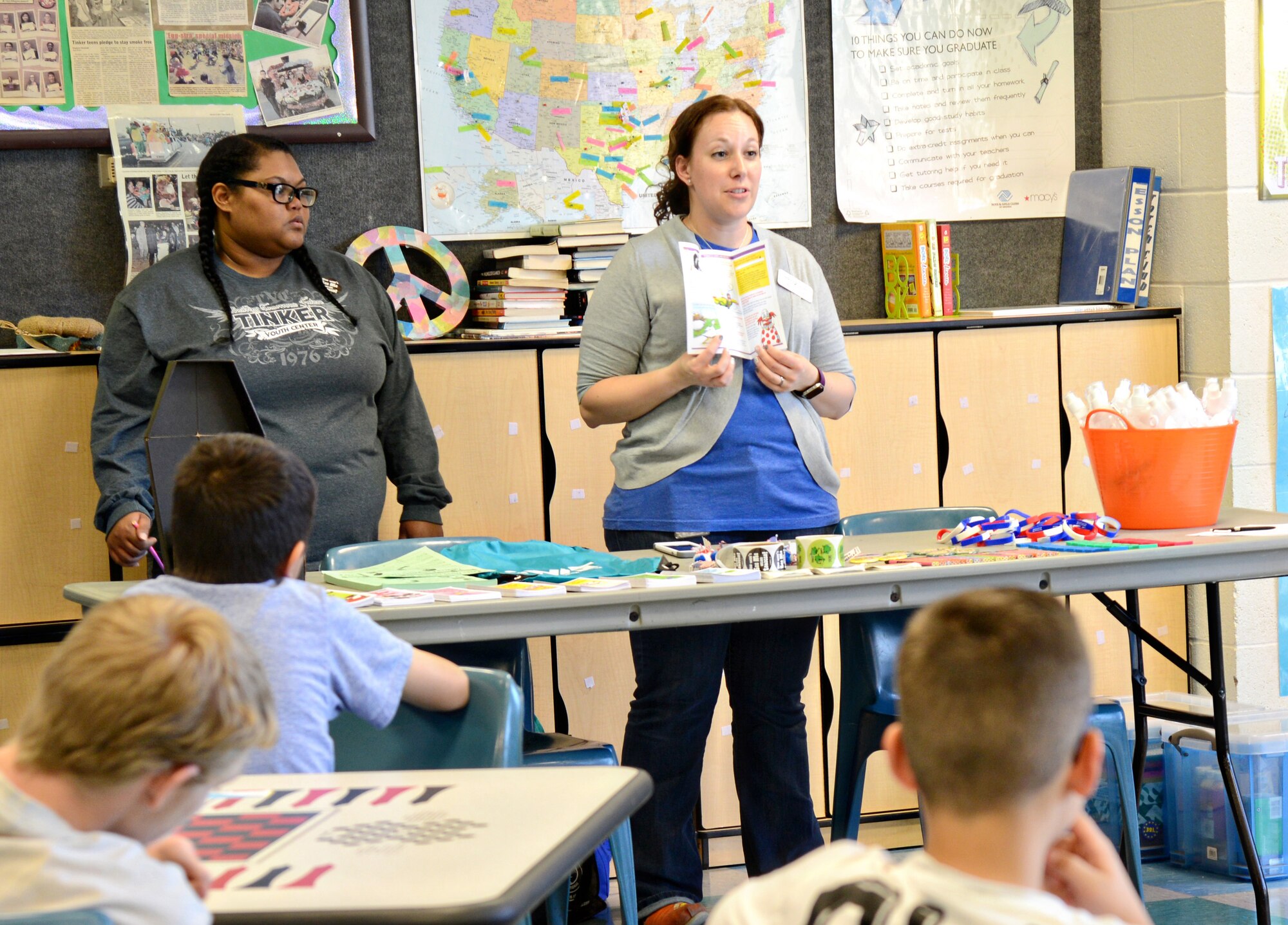Laura Crowder, with the 72nd Aerospace Medicine Squadron’s Health Promotions office, hosted a Kick Butts presentation at the Tinker Youth Center on March 16. The event encouraged youth to remain tobacco-free.  (Air Force photo by Kelly White/Released)