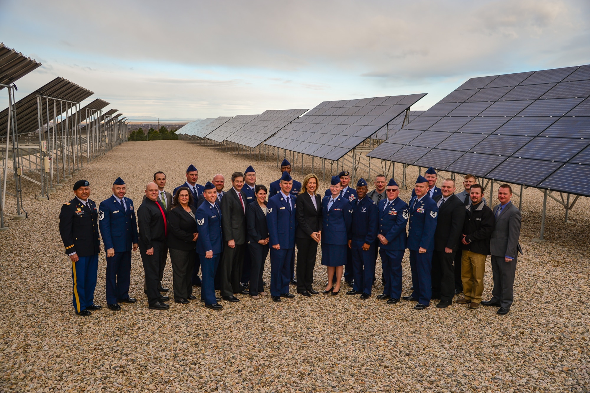 Dr. Elizabeth Sherwood-Randall, Deputy Secretary of Energy, center, poses with Solar Ready Vets participants March 25 at Hill Air Force Base’s solar array field. The participants, comprising the first class from Hill AFB, graduated later in the day during a ceremony featuring Sherwood-Randall as the guest speaker. Hill was chosen to be part of the program based on the number of exiting military personnel from the installation, the strength of the surrounding solar market, and the capacity of nearby training institutions. (U.S. Air Force photo by R. Nial Bradshaw)