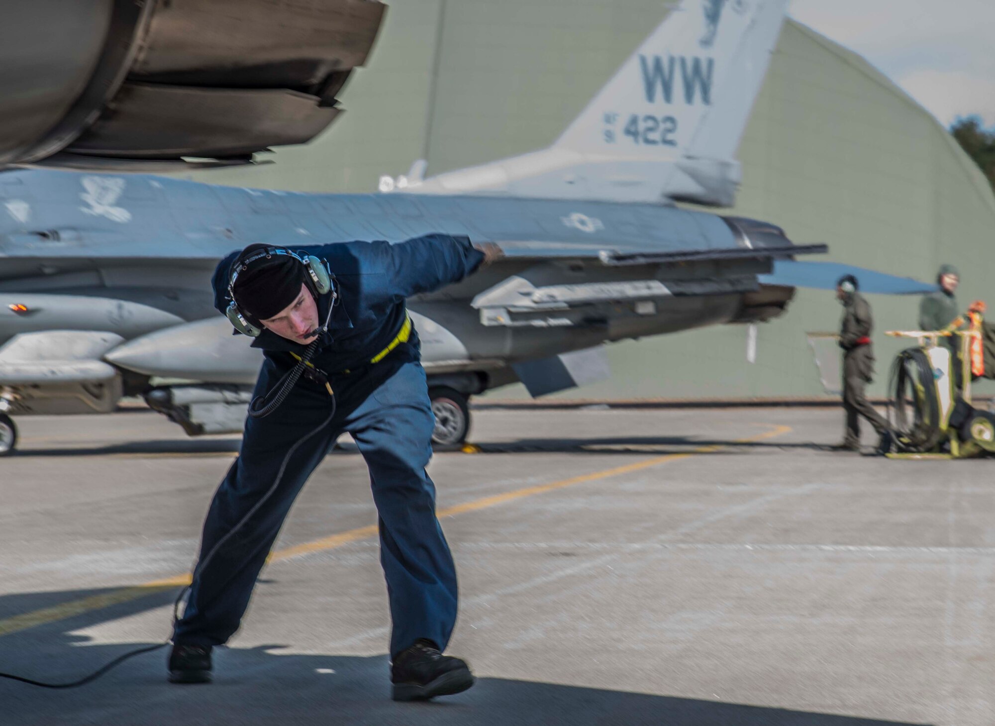 U.S. Air Force Airman Joseph Farmer, a crew chief with the 35th Maintenance Squadron, conducts a pre-flight check on an F-16 Fighting Falcon during exercise Beverly Sunrise 16-03 at Misawa Air Base, Japan, March 23, 2016. Misawa’s crew chiefs are responsible for ensuring every F-16 meets standards through inspection and maintenance. (U.S. Air Force photo by Airman 1st Class Jordyn Fetter)