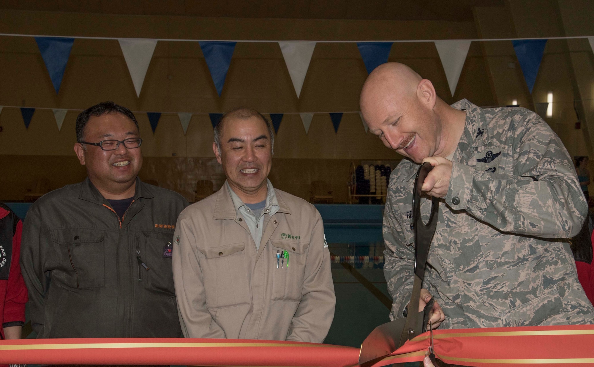U.S. Air Force Col. Travis Rex, the vice commander of the 35th Fighter Wing, conducts a Himberg Pool ribbon cutting ceremony at Misawa Air Base, Japan, March 25, 2016. The pool began construction in early 2015 for improvements to the facility. The reopened site is open to everyone with access to Misawa AB and free for use.
