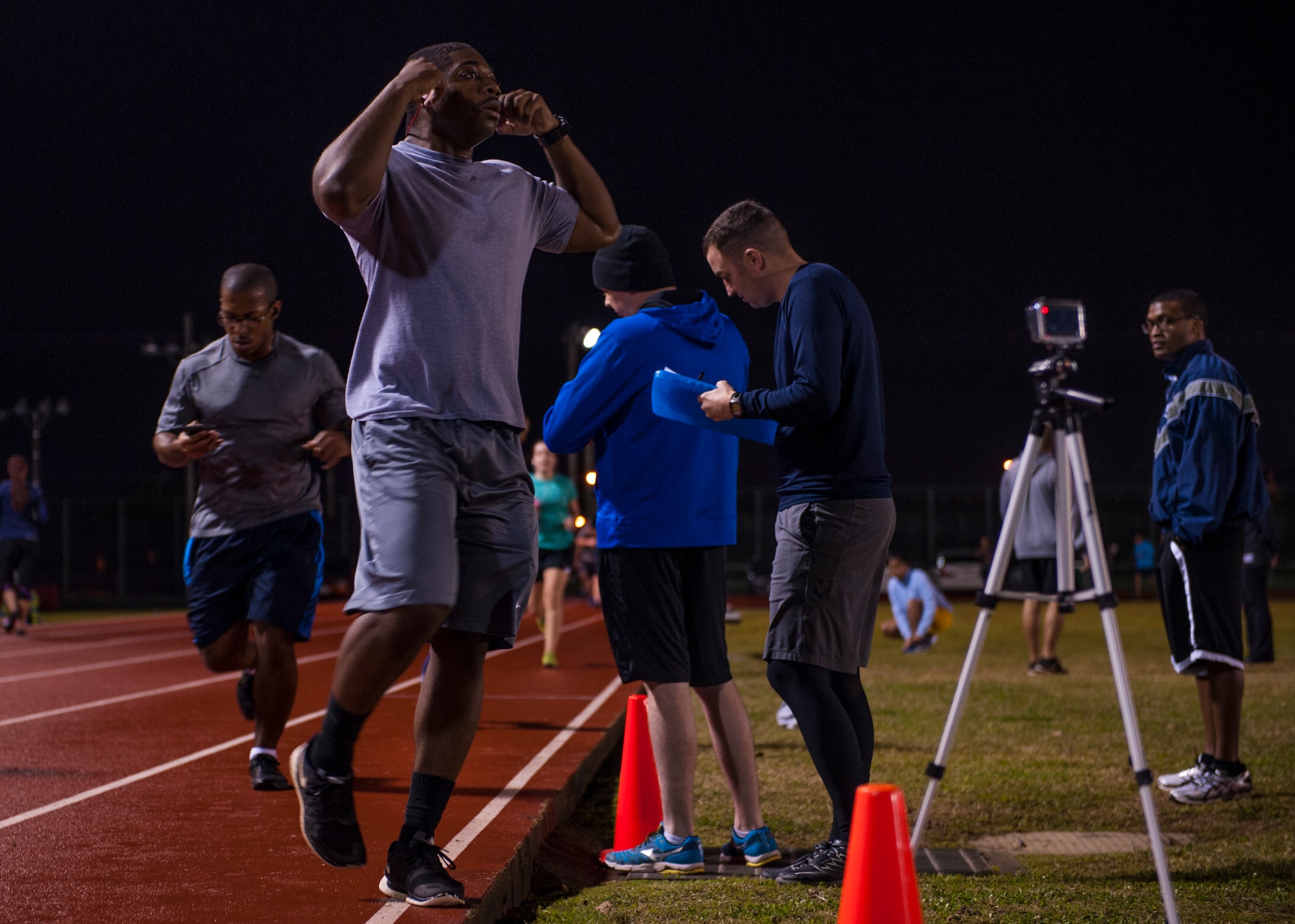Runners finish the last run of the eight-week running improvement program March 18, 2016, at Kadena Air Base, Japan. RIP began in 2011 at Sheppard Air Force Base, Texas, where a group of runners and an exercise physiologist at the Health and Wellness Center determined that there was a need to teach people how to run correctly. (U.S. Air Force photo by Airman 1st Class Nick Emerick)

