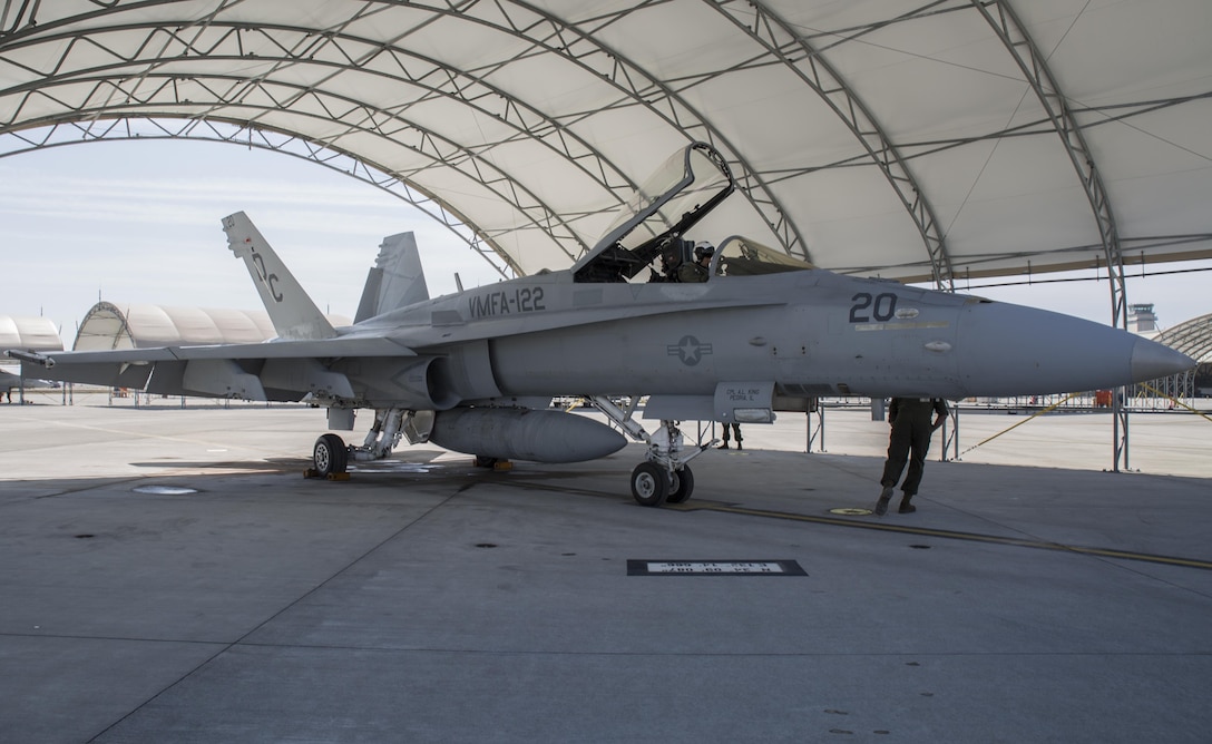An F/A-18C Hornet with Marine Fighter Attack Squadron 122, sits on the flight line at Marine Corps Air Station Iwakuni, Japan, March 22, 2016. VMFA-122, also known as the “Werewolves,” arrived in Iwakuni March 14 from Marine Corps Air Station Beaufort, South Carolina for a six month rotation with the unit deployment program. 