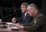 Defense Secretary Ash Carter and Marine Corps Gen. Joe Dunford, chairman of the Joint Chiefs of Staff, answer questions about efforts against the Islamic State of Iraq and the Levant during a news conference at the Pentagon, March 25, 2016. (DoD photo by Navy Petty Officer 1st Class Tim D. Godbee)