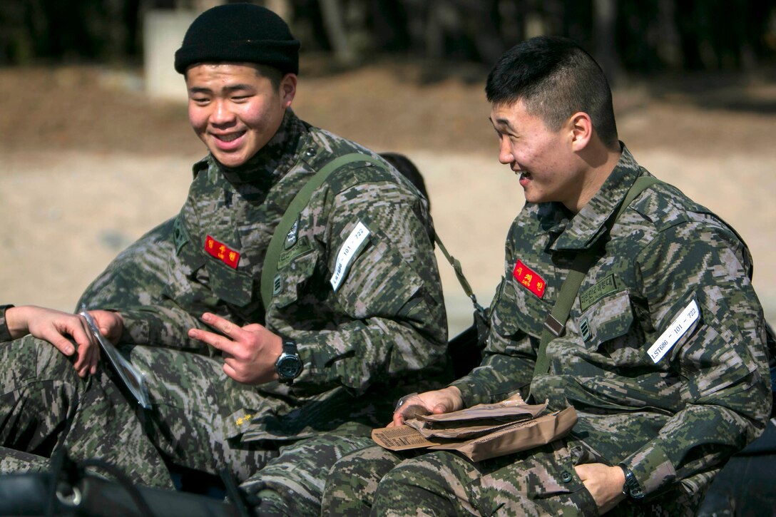 South Korean marines pause for a meal during exercise Ssang Yong 16 near Pohang, South Korea, March 12, 2016. Marine Corps photo by Lance Cpl. Sean M. Evans