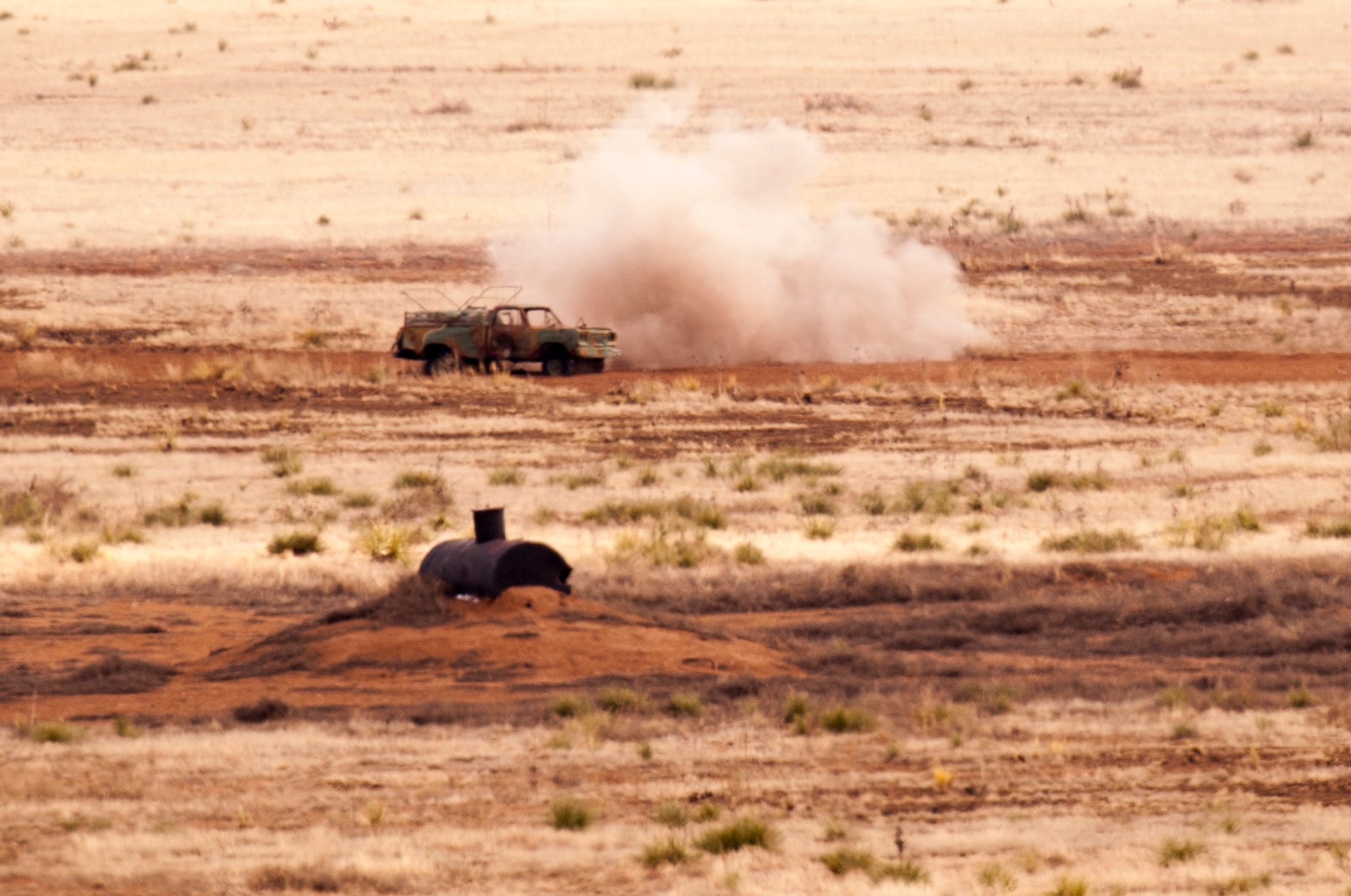 Rounds fired from an AC-130W Stinger II assigned to the 73rd Special Operations Squadron, impact Range 10 during a live-fire training mission Feb. 3, 2016, Melrose Air Force Range, N.M. This marked the first use of Range 10 in 45 years and its opening will increase training for air to ground, small arms, and electronic combat. (U.S. Air Force photo/Tech. Sgt. Manuel Martinez)