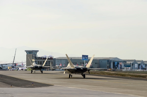 Two F-22 Raptors from Langley AFB, Va., arrived in Santiago, Chile to participate in the International Air and Space Fair (FIDAE), March 27, 2016.  More than 65 Airmen from around the U.S. are scheduled to participate in a variety of activities during the week-long air show that includes aerial demonstrations, interaction with the local community, and subject matter expert exchanges with the Chilean air force. The F-22 Raptor Demonstration Team performs precision aerial maneuvers that demonstrate the unique capabilities of the world’s only operational fifth-generation fighter aircraft.  (U.S. Air Force photo by Tech. Sgt. Heather Redman/Released)
