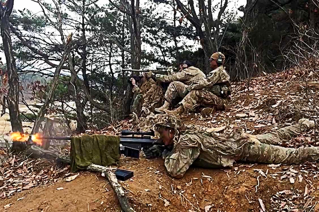 Soldiers engage targets with the assistance of a spotter during a live-fire exercise at Rodriguez Live Fire Complex, South Korea, March 15, 2016. The soldiers are snipers assigned to the 2nd Battalion, 3rd Infantry Regiment. Army photo by Spc. Loren Keely