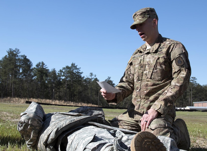 Sgt. Nicholas Contestable, 1st Bn., 321st Inf. Reg., 98th Training Div., completes a simulated medevac during the Army Warrior Tasks (AWT) portion of the Drill Sgt. of the Year competition at Fort Jackson, South Carolina, March 21st.