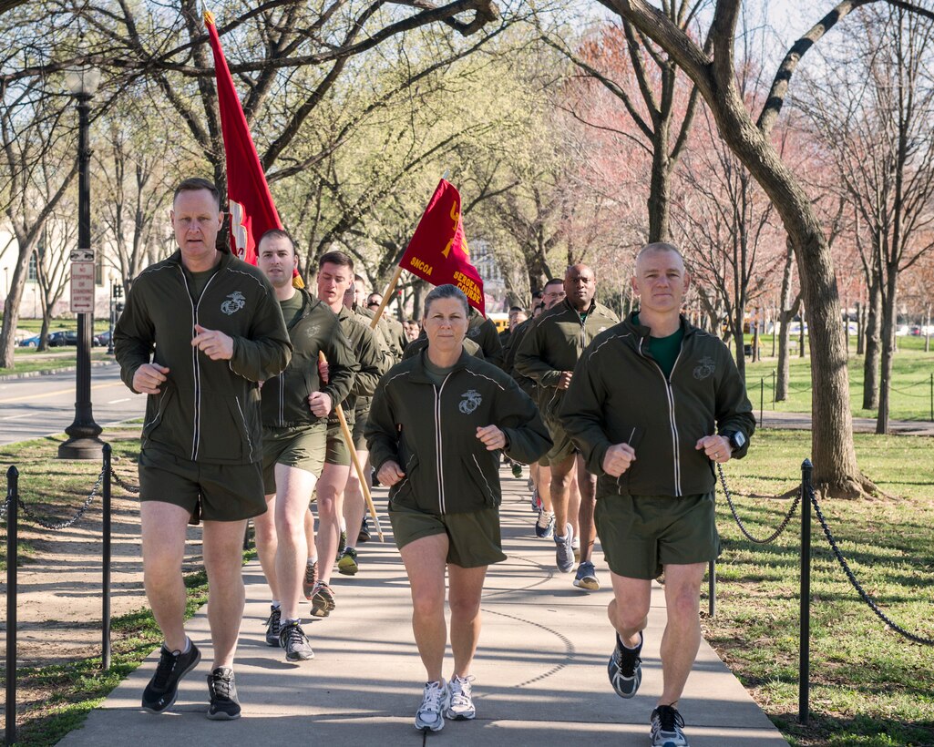 U.S. Marines with the Staff Non Commissioned Officer Academy, Quantico, Va., participate in the director's motivational run in Washington, D.C., March 18, 2016. During the run, Marines visited and learned about landmarks such as the Captial Building, Washington and Lincoln Memorials, and the Marine Corps War Memorial. (U.S. Marine Corps photo by Cpl. Timothy Turner/Released)
