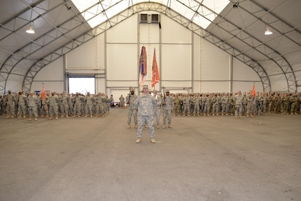 Soldiers of the 392nd Expeditionary Signal Battalion stand in formation during a deployment ceremony on March 26, 2016 at Fort Meade, Md.