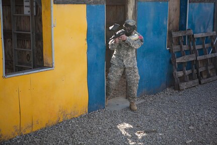 U.S. Army Reserve Careers Division Sgt. First Class Anthony Bohanon competes in the urban assault course event as part of the joint Best Warrior Competition March 22nd, 2016 at Ft. Knox, Kentucky. The Best Warrior Competition is a four-day competition that tests competitors' Army aptitude by going through urban warfare situations, board interviews, physical fitness tests, written exams, Warrior tasks and battle drills relevant to today's operational environment. (U.S. Army photo by Sgt. Amber Stephens)