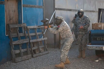 U.S. Army Reserve Careers Division Sgt. First Class Harrt Torresramos moves through the urban assault course as part of the joint Best Warrior Competiton March 22nd, 2016 on Ft. Knox, Kentucky. The Best Warrior Competition is a four-day competition that tests competitors' Army aptitude by going through urban warfare situations, board interviews, physical fitness tests, written exams, Warrior tasks and battle drills relevant to today's operational environment. (U.S. Army photo by Sgt. Amber Stephens)