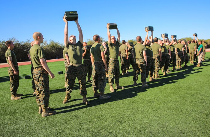 Recruits of Mike Company, 3rd Recruit Training Battalion, perform ammunition can lifts during a combat fitness test at Marine Corps Recruit Depot San Diego, March 24. Recruits paired up for this portion of the event so their partners could count for them while they performed each lift. Annually, more than 17,000 males recruited from the Western Recruiting Region are trained at MCRD San Diego. Mike Company is scheduled to graduate April 15.