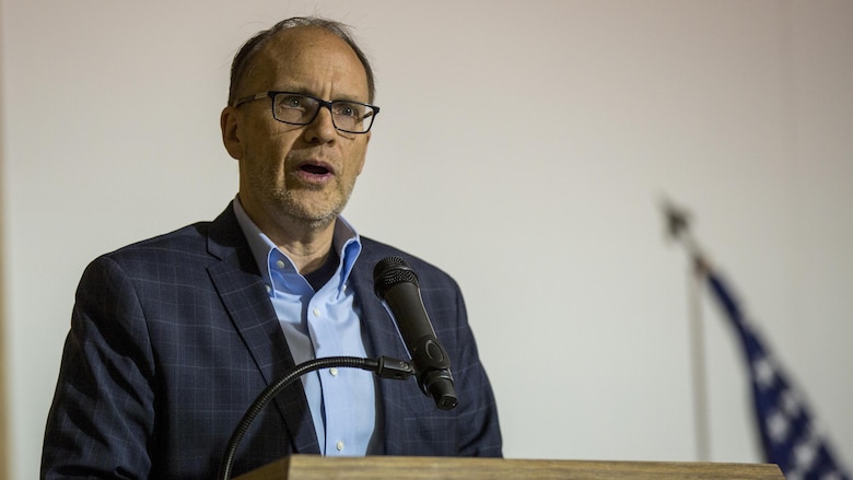 Ambassador Douglas A. Silliman, the U.S. Ambassador to Kuwait, presents remarks at the Special Purpose Marine Air Ground Task Force-Crisis Response-Central Command's Corporals Course graduation ceremony in Kuwait on March 25, 2016. The corporals’ leadership program is designed to provide instruction for tasks developed in accordance with Marine Corps Order 1510.90, Individual Training Standards. Corporals Course is a professional military education requirement for all corporals to complete in order to be qualified for promotion.