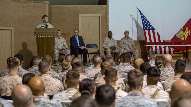 U.S. Marine Col. William F. McCollough, commanding officer of Special Purpose Marine Air Ground Task Force-Crisis Response-Central Command, addresses the audience during a Corporals Course graduation ceremony in Kuwait on March 25, 2016. The corporals’ leadership program is designed to provide instruction for tasks developed in accordance with Marine Corps Order 1510.90, Individual Training Standards. Corporals Course is a professional military education requirement for all corporals to complete in order to be qualified for promotion. 