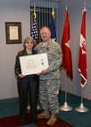 Presented by Col. Robert Ruch, Debra Valine received the Commander's Award for Civilian Service for exceptional performance as the acting managing editor of the Public Works Digest and producing two superb issues while actively contributing to a third issue of the publication, which serves the Army's public work's community.