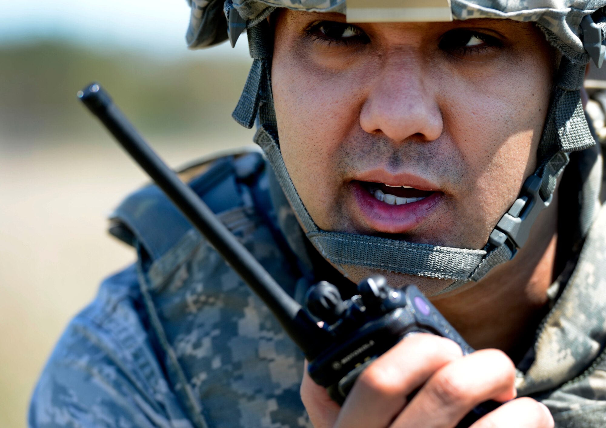 U.S Air Force Airman Julian Arnold, 20th Security Forces Squadron base defense operations center controller, speaks into his radio during operational readiness exercise Weasel Victory 16-08 at Shaw Air Force Base, S.C., March 22, 2016. ORE’s are conducted to properly assess the combat capabilities of the 20th Fighter Wing.  (U.S. Air Force photo by Senior Airman Michael Cossaboom)