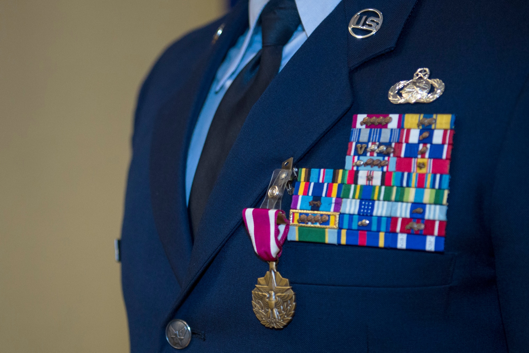 A Meritorious Service medal rests on U.S. Air Force Chief Master Sgt. Samuel Freeman’s, 23d Logistics Readiness Squadron chief enlisted manager, uniform during his retirement ceremony, March 25, 2016, at Moody Air Force Base, Ga. Service members, family and friends gathered to celebrate his 26-years of service to the Air Force. (U.S. Air Force photo by Airman 1st Class Greg Nash/Released) 
