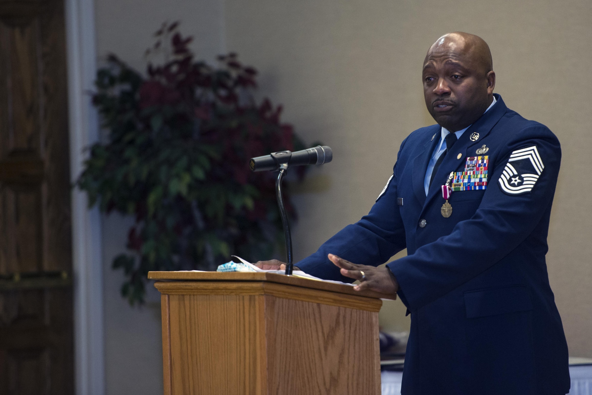 U.S. Air Force Chief Master Sgt. Samuel Freeman, 23d Logistics Readiness Squadron chief enlisted manager, speaks during his retirement ceremony, March 25, 2016, at Moody Air Force Base, Ga. Freeman credited his faith, family, friends and fellow service members for his best memories along his journey of military service. (U.S. Air Force photo by Airman 1st Class Greg Nash/Released) 
