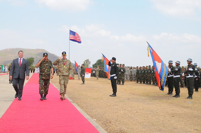 (left to right)Ambassador William Headt, the U.S. Ambassador to the Kingdom of Cambodian; Royal Cambodian Army Gen. Meas Sophea; and Maj. Gen. Todd McCaffrey, U.S. Army Pacific's Deputy Commander, troop the line to conclude the Angkor Sentinel 2016 closing ceremony March 25, 2016, at the Training School for Multinational Peacekeeping Forces in Kampong Speu Province, Cambodia. This year marked the seventh iteration of the annual bilateral military exercise hosted by the Royal Cambodian Armed Forces and sponsored by the U.S. Army Pacific that’s designed to collectively strengthen the two countries’ humanitarian assistance and disaster relief capabilities and improve military-to-military cooperation. 