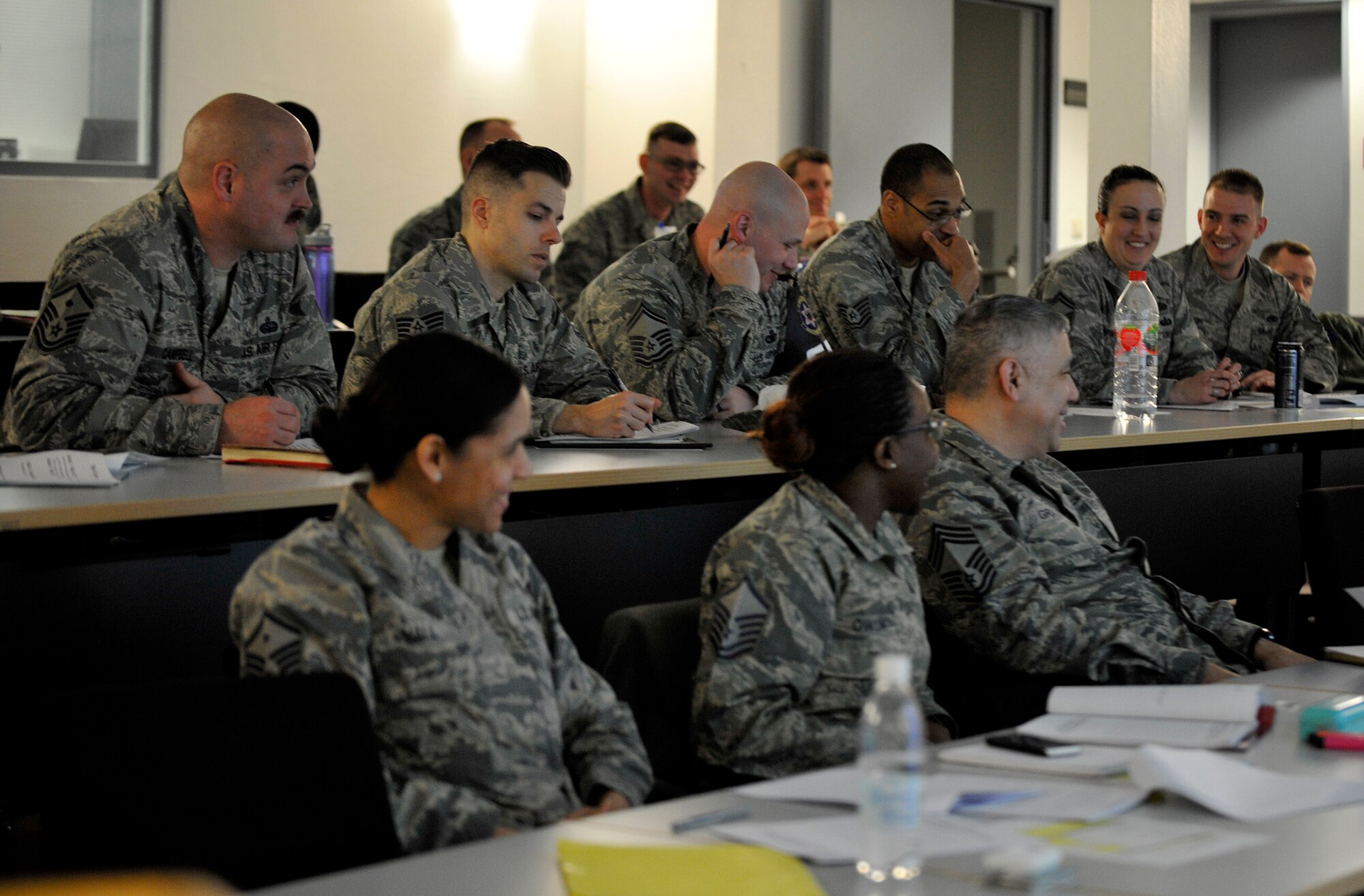 86th Airlift Wing leaders participate in a hands-on activity during a Core Values Coaching workshop March 21, 2016, at Ramstein Air Base, Germany. The CVC workshop focused on taking skills the 86th AW Airmen already have to teach their subordinates in a purposeful way, to in turn strengthen the building blocks of the Ramstein mission. (U.S. Air Force photo/Airman 1st Class Larissa Greatwood)