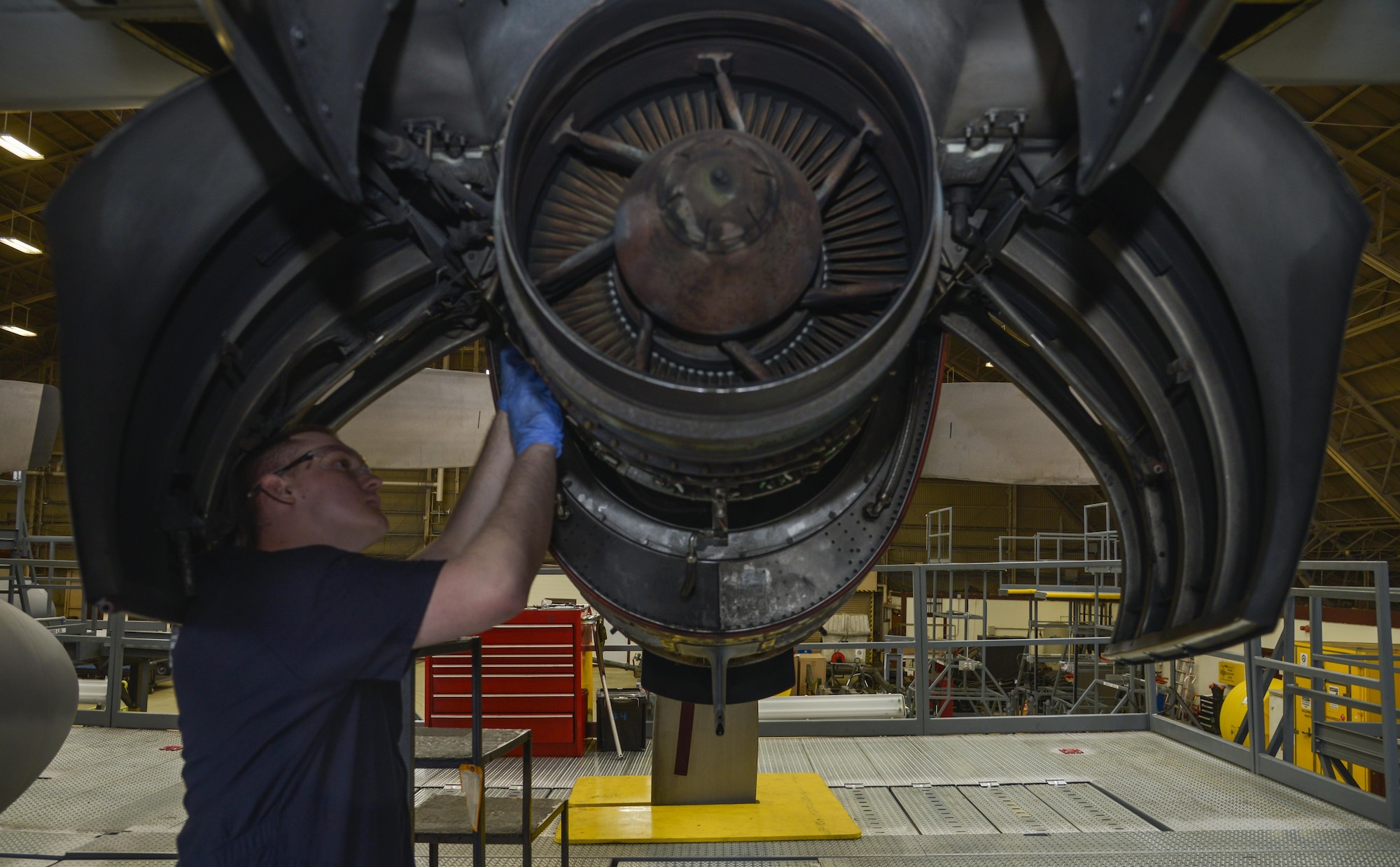 Airman 1st Class Alexander Forest, 374th Maintenance Squadron aerospace propulsion apprentice, installs a thermocouple on part of a MC-130 Talon II at Yokota Air Base, Japan, Feb. 26, 2016. The MC-130 and C-130 Hercules aircraft go through a 14 to 16-day isochronal inspection that is split into four phases: look phase, fix phase, inspection phase and the quality assurance phase. (U.S. Air Force photo by Senior Airman David Owsianka/Released)