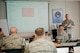 Senior Master Sgt. Michael Gralewski, 51st Force Support Squadron superintendent of manpower and organization, teaches Green Belt training to members from Team Osan March 24, 2015 at Osan Air Base, Republic of Korea. Green Belt training provides Air Force member with skills on strategic planning, continuous process improvement (CPI) principles and tools and practical problem solving. (U.S. Air Force photo by Staff Sgt. Jonathan Steffen/Released)