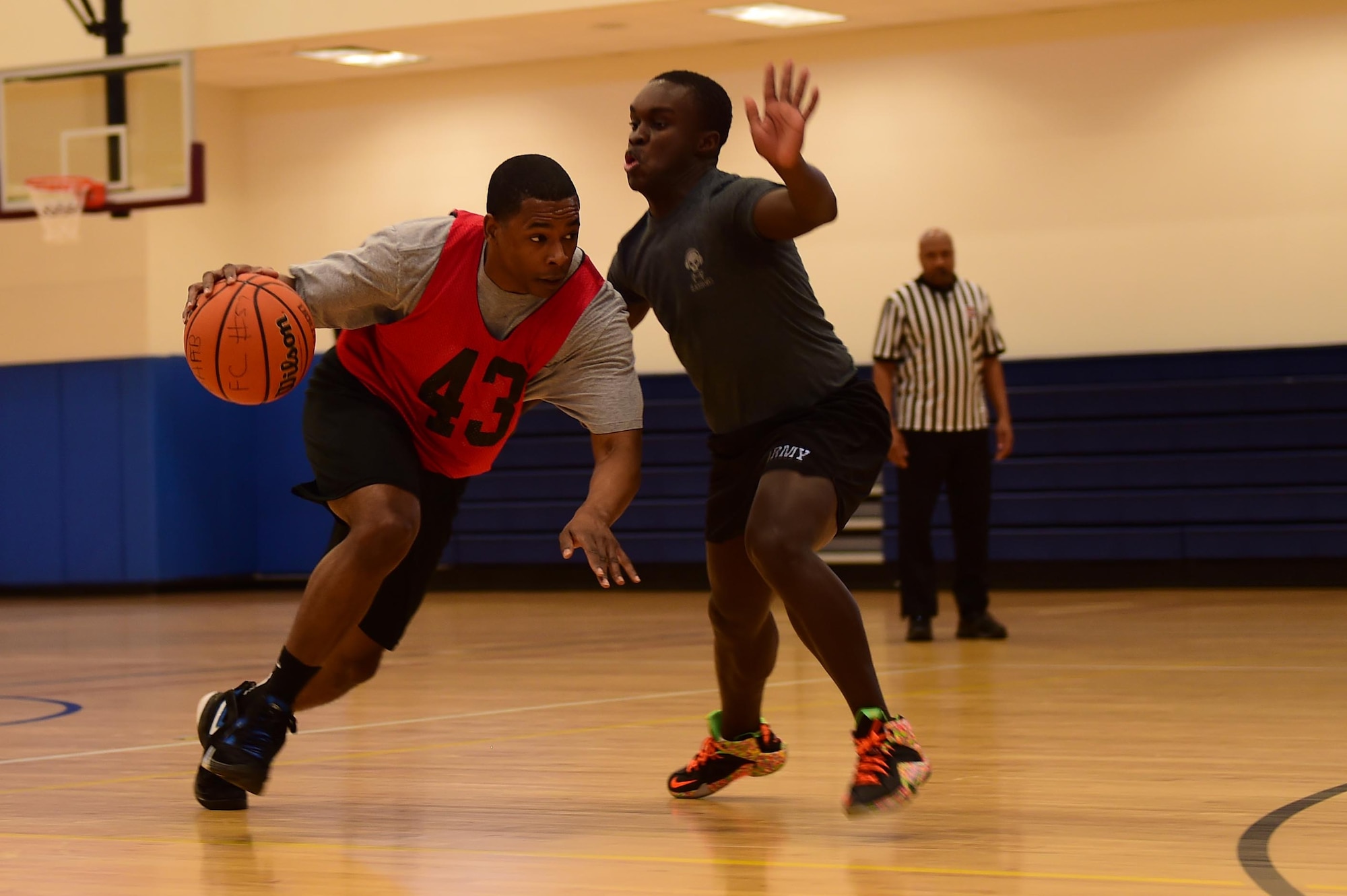 Members for the 743D Military Intelligence Battalion competed in a basketball tournament March 25, 2016, at the Buckley Fitness Center on Buckley Air Force Base, Colo. The tournament was an event for the Commander’s Cup, which is an inter-battalion competition, consisting of approximately eight events. Each time one of the companies win an event, they are awarded points. At the end of the fiscal year, the company with most points wins a trophy and bragging rights. (U.S. Air Force photos by Airman 1st Class Gabrielle Spradling/Released)