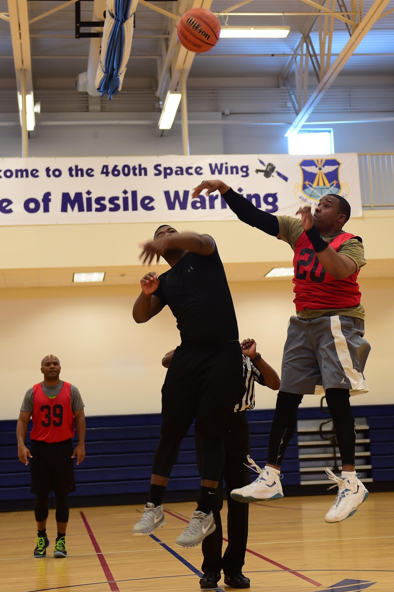 Members for the 743D Military Intelligence Battalion competed in a basketball tournament March 25, 2016, at the Buckley Fitness Center on Buckley Air Force Base, Colo. The tournament was an event for the Commander’s Cup, which is an inter-battalion competition, consisting of approximately eight events. Each time one of the companies win an event, they are awarded points. At the end of the fiscal year, the company with most points wins a trophy and bragging rights. (U.S. Air Force photos by Airman 1st Class Gabrielle Spradling/Released)