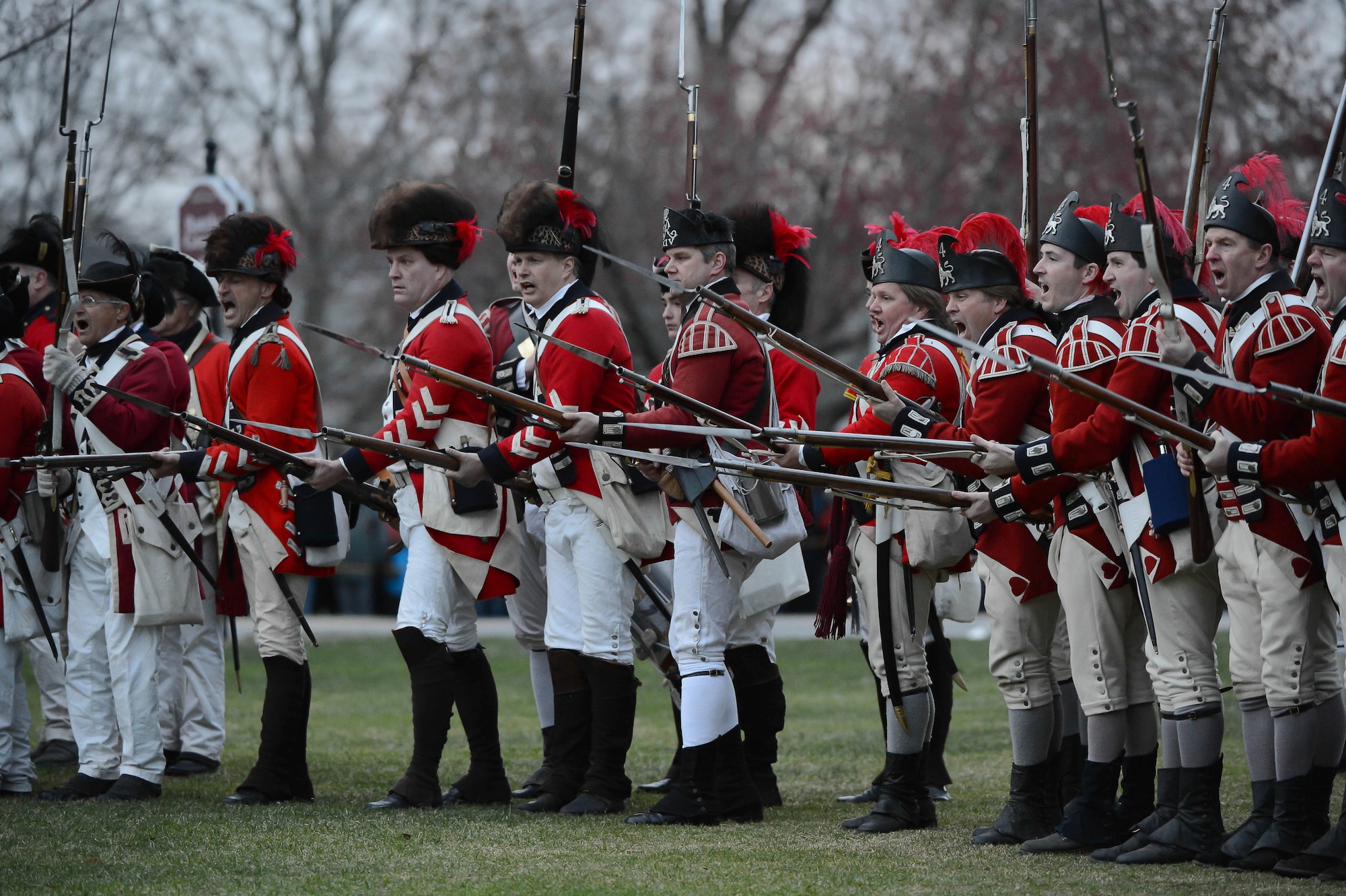 British Regulars reenactors prepare to charge during the Lexington Patriots' Day reenactment on April 20, 2015. Patriots' Day commemorates the opening battle of the American Revolution in 1775. (U.S. Air Force photo by Jerry Saslav)
 