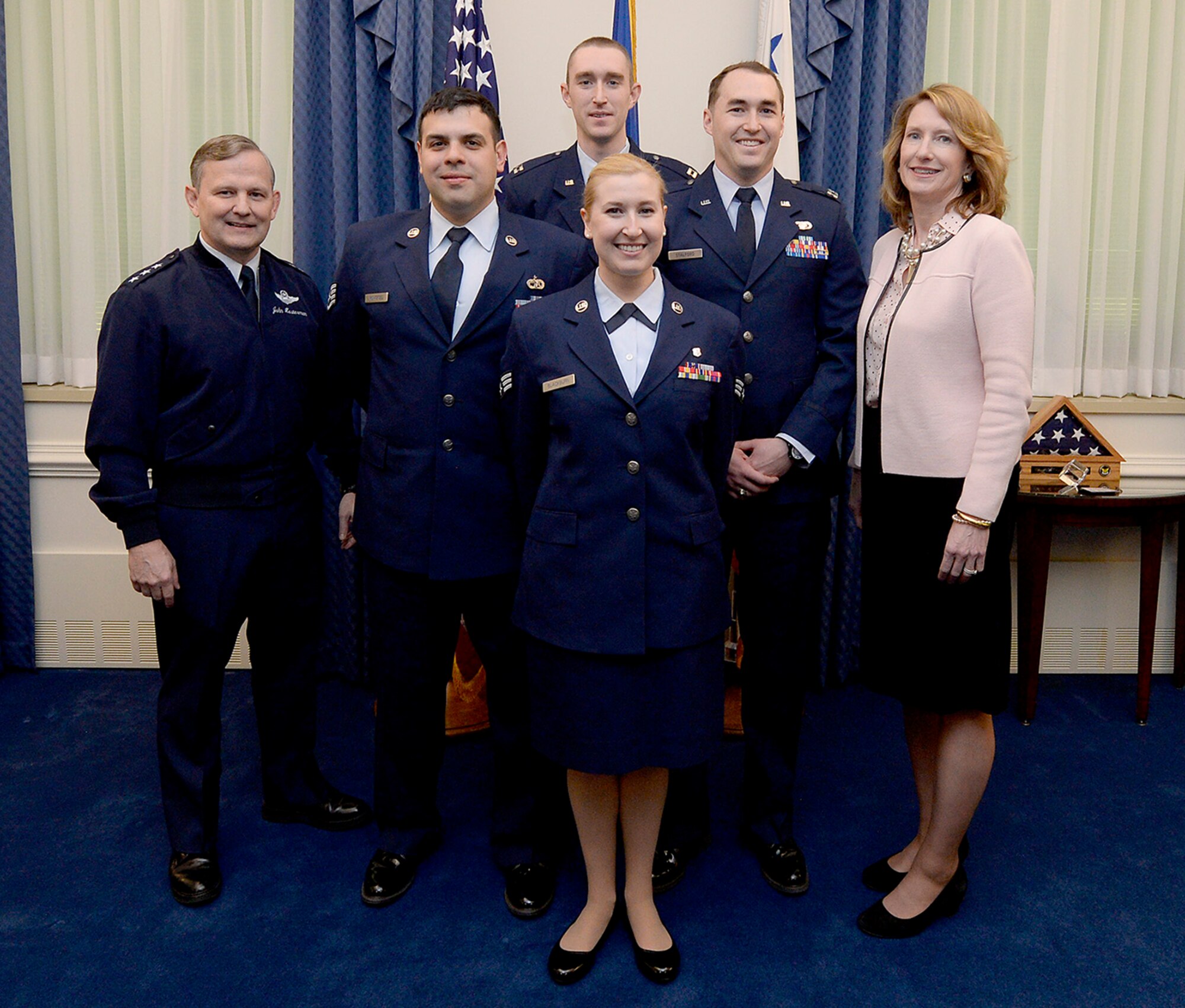 Lt. Gen. John Hesterman, the Air Force assistant vice chief of staff, and Under Secretary of the Air Force Lisa S. Disbrow congratulate Team 3-D Printing in the Pentagon, Feb. 29, 2016. (U.S. Air Force photo/Scott M. Ash)