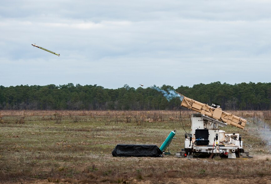 An FIM-92 Stinger missile is fired downrange from the Army's new multi-mission launcher tube at the Eglin Air Force Base range March 23. The 96th Test Wing hosted the Army’s Stinger Based Systems and Raytheon to demonstrate the new launch platform’s capabilities on Eglin’s ranges.  (U.S. Air Force photo/Samuel King Jr.)