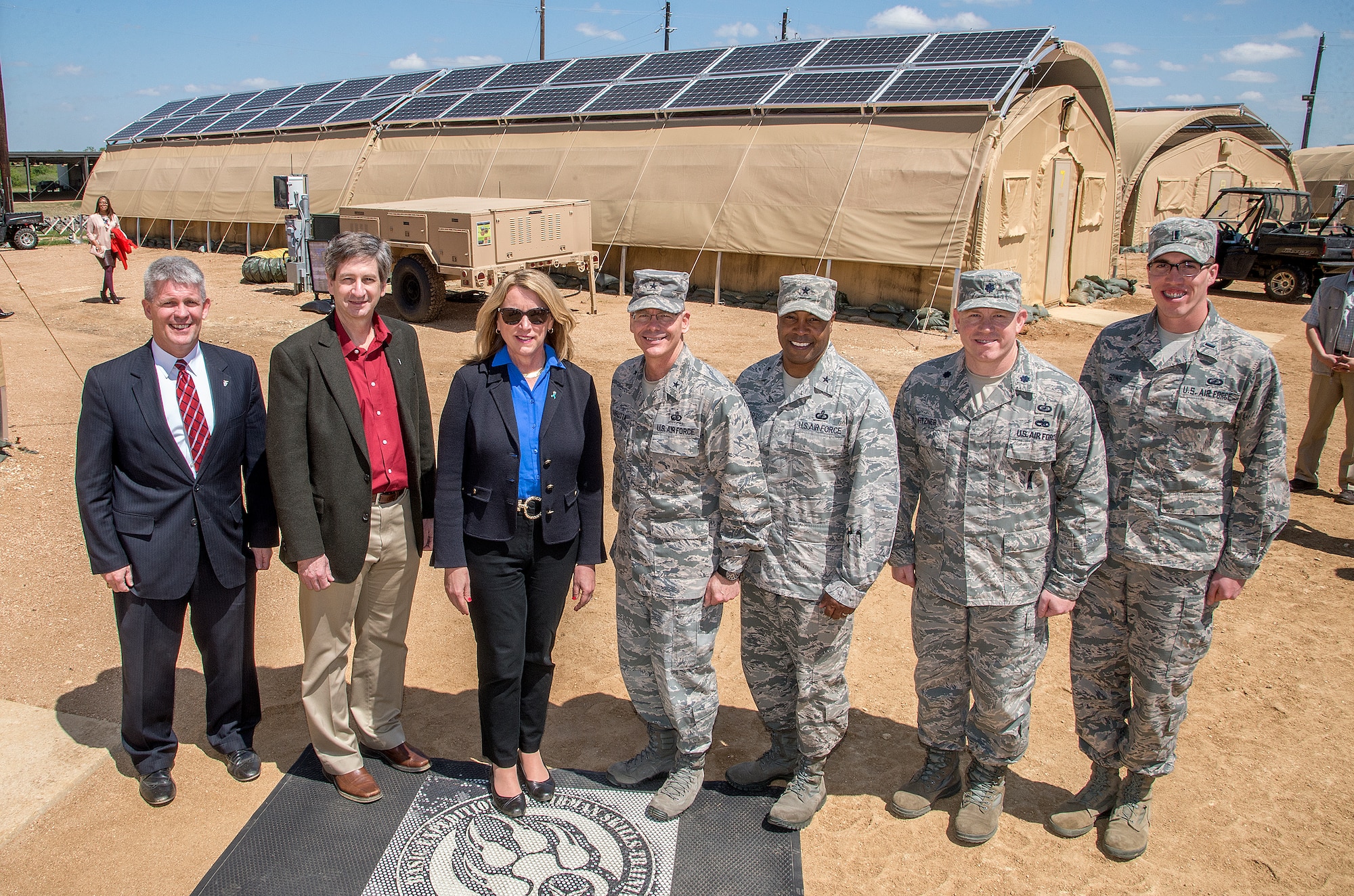 Air Force Secretary Deborah Lee James tours AFRL's FOB of the Future at Joint Base San Antonio’s Basic Expeditionary Airmen Skills Training facility on March 22, 2016. Pictured from left to right are:  Thomas Lockhart, Director, Materials and Manufacturing Directorate, AFRL; Mark Correll, Deputy Assistant Secretary of the Air Force for Environment, Safety and Infrastructure; Deborah Lee James, Secretary of the Air Force; Brig. Gen. Robert LaBrutta, Commander, 502nd Air Base Wing and Joint Base San Antonio, Texas; Brig. Gen. Trent Edwards, Commander, 37th Training Wing, Joint Base San Antonio, Texas; Lt. Col. Scott Fitzner, Chief, Acquisition Systems Support Branch, Materials and Manufacturing Directorate, AFRL; 1st Lt.Jason Goins, Project Engineer, Acquisition Systems Support Branch, Materials and Manufacturing Directorate, AFRL. (U.S. Air Force Photo/Staff Sergeant Marissa Garner)