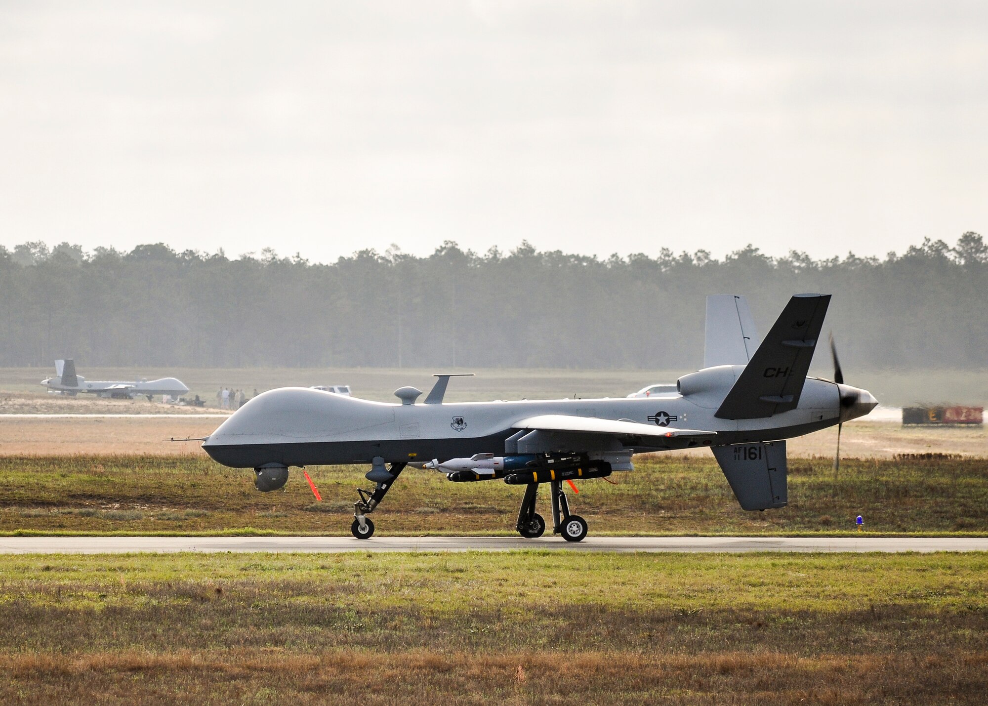 An MQ-9 Reaper prepares to take off from Duke Field, Fla., March 15. The Reapers operated at both Duke Field and Eglin Air Force Base, Fla., during the air-to-ground Weapon System Evaluation Program, Combat Hammer, from March 14-17. (U.S. Air Force photo by Susan Garcia)