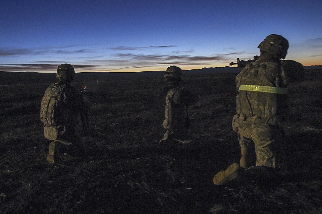 Soldiers open fire at opposing forces during Exercise Turbo Distribution 16-02 at Amedee Army Airfield, Calif., March 15, 2016. The soldiers are assigned to the 688th Rapid Port Opening Element, deployed from Joint Base Langley-Eustis, Va. Air Force photo by Staff Sgt. Robert Hicks