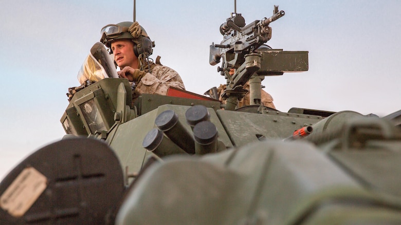 Capt. Charles H. Richardson, commanding officer, Company B, 3rd Light Armored Reconnaissance Battalion, plots points on a map in the Combat Center training area March 21, 2016, during a Marine Corps Combat Readiness Evaluation Exercise. 3rd LAR conducted a five-day MCCREE to evaluate the combat readiness of B Co.