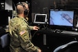 Sgt. 1st Class David Lovett, course coordinator at the Army Reserve's
Medical Skills Training Center on Joint Base McGuire-Dix-Lakehurst, New
Jersey, manages the realistic lifesaving training needed for combat medics'
EMT certification.