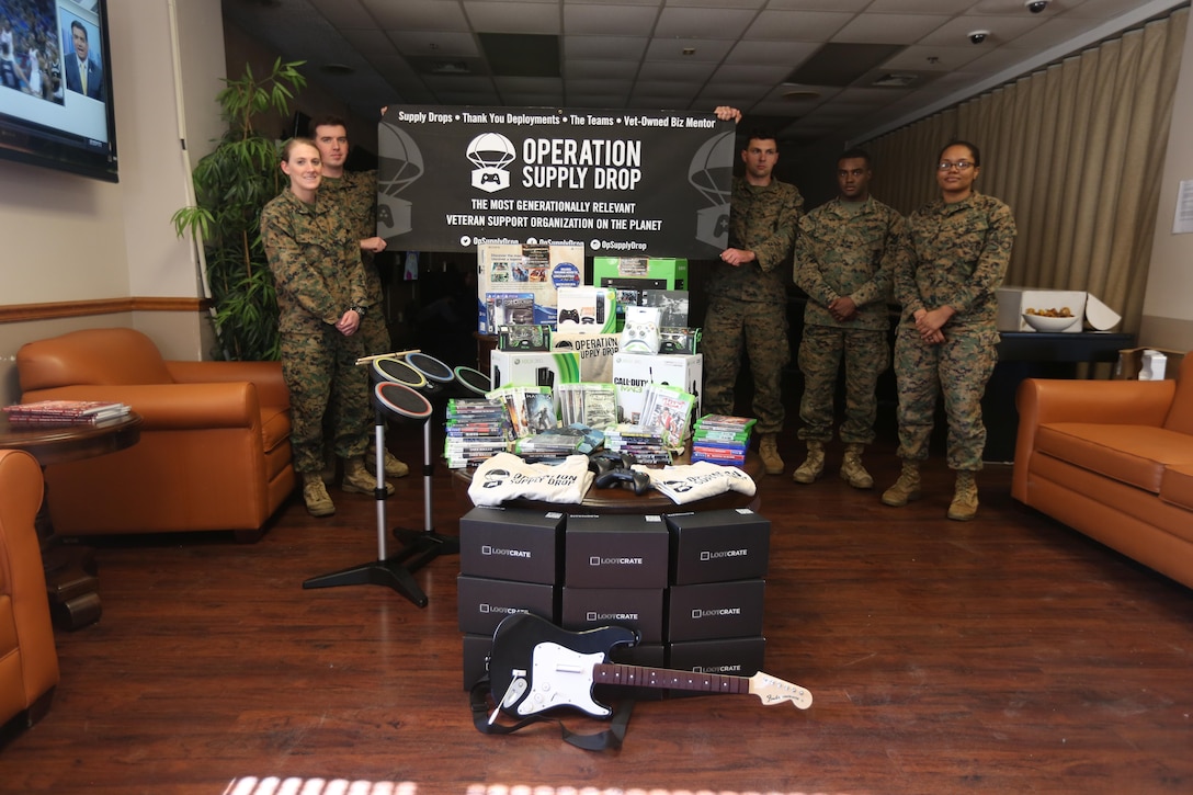 Operation Supply Drop presented donated video games for Marines at the Central Area Recreation Center on Marine Corps Base Camp Lejeune, Feb. 11. Operation Supply Drop also donated to the French Creek recreation center and plans to donate to the other five recreation centers on base and Marine Corps Air Station New River in the future. (U.S. Marine Corps photo by Cpl. Mark Watola /released)