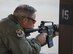 Lt. Gen. Chris Nowland, 12th Air Force (Air Forces Southern) commander, fires a GAU-5 at the off base shooting range outside of Mountain Home Air Force Base, Idaho, March 24, 2016. American service members have used the GAU-5 since the 1970s. (U.S. Air Force photo by Airman 1st Class Chester Mientkiewicz/Released)