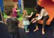 Kristan Nowland, wife of Lt. Gen. Chris Nowland, 12th Air Force (Air Forces Southern) commander, plays with children in the Gunfighter Kids Gym at Mountain Home Air Force Base, March 23, 2016. Nowland visited Mountain Home Air Force Base with her husband to see the various quality of life programs offered to military members. (U.S. Air Force photo by Airman Alaysia Berry/ Released)