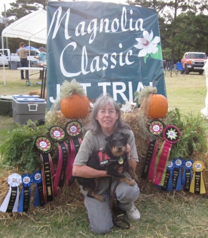 The Environmental Laboratory’s Dena Dickerson, shown with her show dog, Jada, used her canine training and field trial expertise to test a possible solution to chase off birds causing extensive damages at Oklahoma’s Robert S. Kerr Lock and Dam. The impressive experiment with Panda, her own border collie, resulted in the Corps’ Tulsa District purchase of border collie Ellie, who keeps the facility clear of thousands of cormorants and gulls