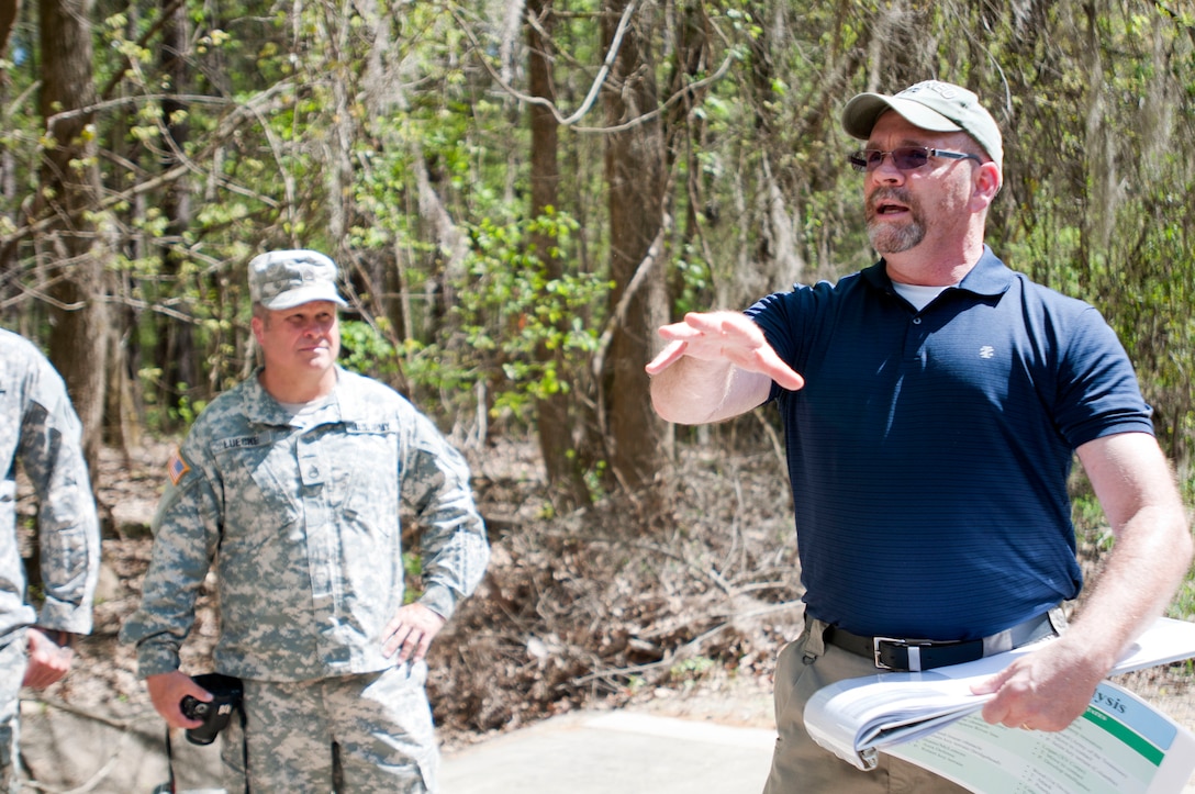 Allen Skinner, Command Historian, 81st Regional Support Command, breaks down some elements of battle during a March 24 tour of Congaree Creek Heritage Preserve in Cayce, South Carolina, and explains to Army Reserve Soldiers how those same leadership skills and tactics can be applied in today's engagements. The historical tour was part of the 108th Training Command (IET) combined Best Warrior and Drill Sergeant of the Year competitions at Fort Jackson, S.C. March 20-25. (U.S. Army photo by Maj. Michelle Lunato/released)